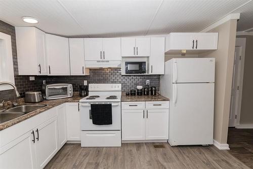8 Mobile Street, Carman, MB - Indoor Photo Showing Kitchen With Double Sink