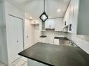 Cuisine - 201-45 Rue Beauséjour, La Prairie, QC  - Indoor Photo Showing Kitchen With Double Sink 