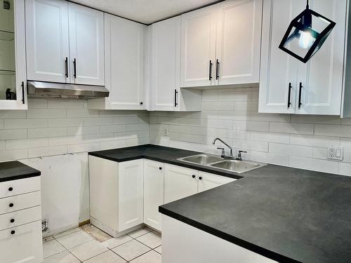 Cuisine - 201-45 Rue Beauséjour, La Prairie, QC - Indoor Photo Showing Kitchen With Double Sink