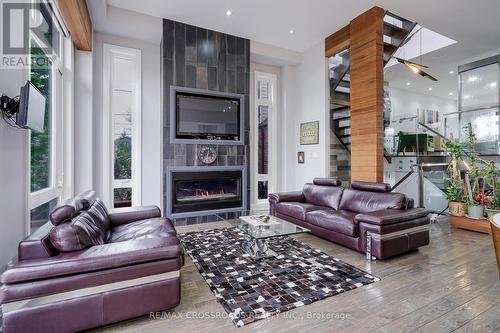 1A Roblin Avenue, Toronto, ON - Indoor Photo Showing Living Room With Fireplace