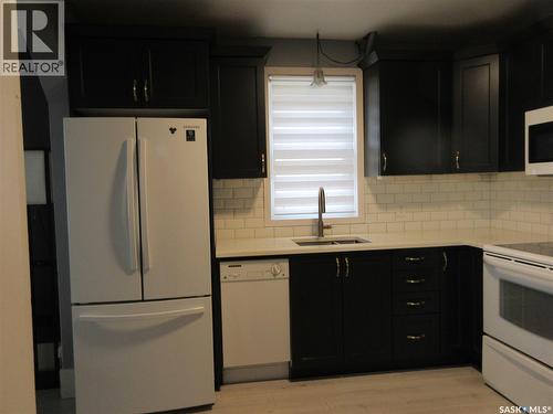 2212 Wallace Street, Regina, SK - Indoor Photo Showing Kitchen With Double Sink