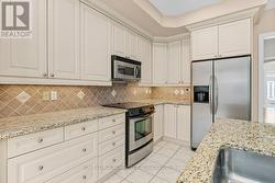 Chef-Inspired Kitchen Features S/S Appliances - 