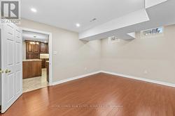 Lower Level Fifth Bedroom with Laminate Flooring - 