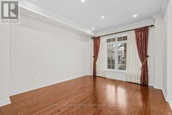 Living Room w/Hardwood Flooring O/L the Front Yard - 