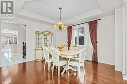 Dining Room w/Hardwood Floor open to Living Room - 