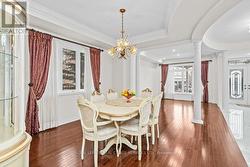 Dining Room w/Hardwood Floor open to Living Room - 
