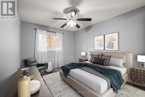 Primary Bedroom Virtually Staged - 203 - 845 Milford Drive, Kingston (North Of Taylor-Kidd Blvd), ON - Indoor Photo Showing Bedroom