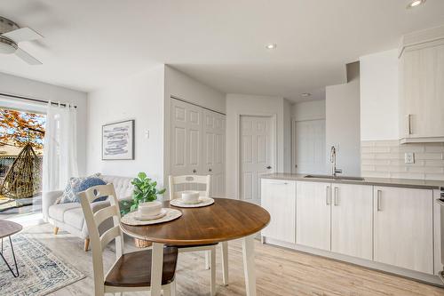 Intergenerational - 1387 Rue Du Bonheur, Saint-Alexandre, QC - Indoor Photo Showing Dining Room With Fireplace