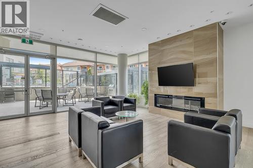 1151 Sunset Drive Unit# 905, Kelowna, BC - Indoor Photo Showing Other Room With Fireplace