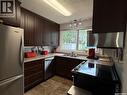 704 1St Avenue, Loon Lake, SK  - Indoor Photo Showing Kitchen With Double Sink 