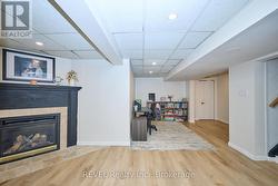 REC ROOM W/GAS FIREPLACE - 