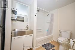 LOWER BATHROOM W/LAUNDRY - 