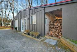 Bunkie with Wood Storage - 