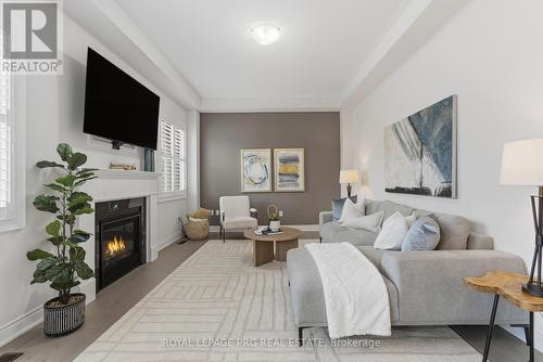 61 Cattail Crescent, Hamilton, ON - Indoor Photo Showing Living Room With Fireplace