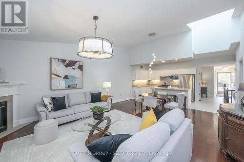 11 - 1337 Commissioners Road W, London South (South B), ON - Indoor Photo Showing Living Room With Fireplace
