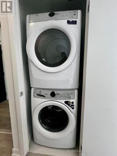 N2007 - 7 Golden Lion Heights, Toronto, ON - Indoor Photo Showing Laundry Room