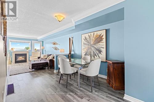 61 Cranberry Surf Street, Collingwood, ON - Indoor Photo Showing Dining Room With Fireplace