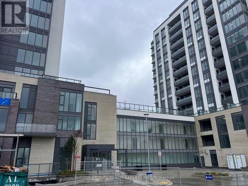 B1002 - 715 Davis Drive, Newmarket, ON - Outdoor With Balcony With Facade