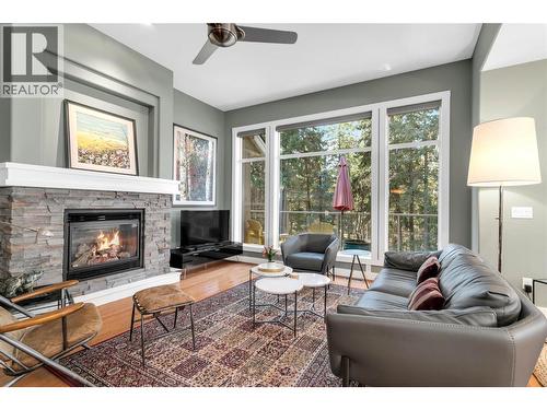 4116 Gallaghers Woodlands Drive S, Kelowna, BC - Indoor Photo Showing Living Room With Fireplace