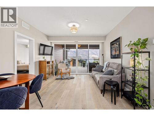 Floor to ceiling windows in the living room - 3475 Granite Close Unit# 109, Kelowna, BC - Indoor