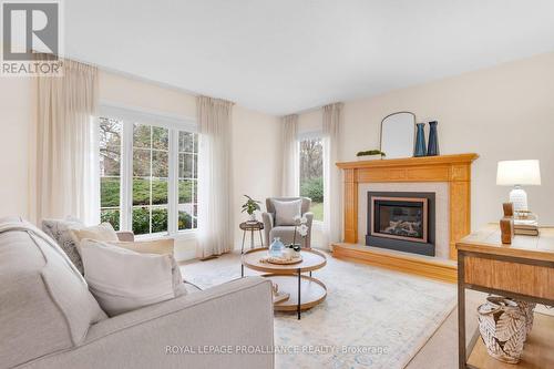 7 North Drive, Brighton, ON - Indoor Photo Showing Living Room With Fireplace