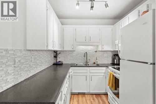 3155 Gordon Drive Unit# 304, Kelowna, BC - Indoor Photo Showing Kitchen With Double Sink With Upgraded Kitchen
