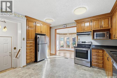 449 Simon Fraser Crescent, Saskatoon, SK - Indoor Photo Showing Kitchen With Double Sink