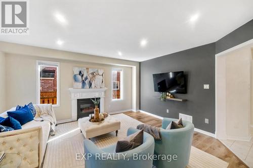 8 Kerrison Drive W, Ajax, ON - Indoor Photo Showing Living Room With Fireplace