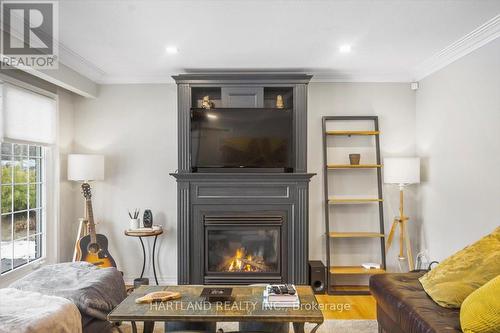 19 Kenworth Drive, St. Catharines, ON - Indoor Photo Showing Living Room With Fireplace