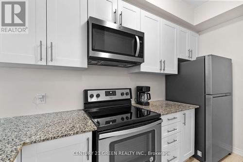 306 - 2370 Khalsa Gate, Oakville, ON - Indoor Photo Showing Kitchen