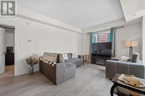 306 - 2370 Khalsa Gate, Oakville, ON - Indoor Photo Showing Living Room