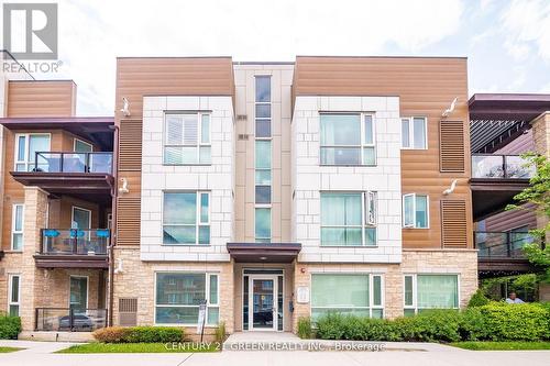 306 - 2370 Khalsa Gate, Oakville, ON - Outdoor With Balcony With Facade
