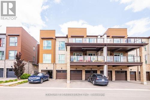 306 - 2370 Khalsa Gate, Oakville, ON - Outdoor With Balcony With Facade