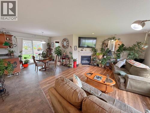 8 Eagle Crescent, Princeton, BC - Indoor Photo Showing Living Room With Fireplace