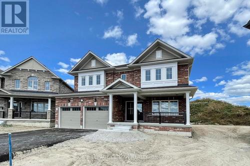 87 Lawrence D. Pridham Avenue, New Tecumseth, ON - Outdoor With Facade