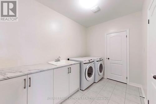 87 Lawrence D. Pridham Avenue, New Tecumseth, ON - Indoor Photo Showing Laundry Room
