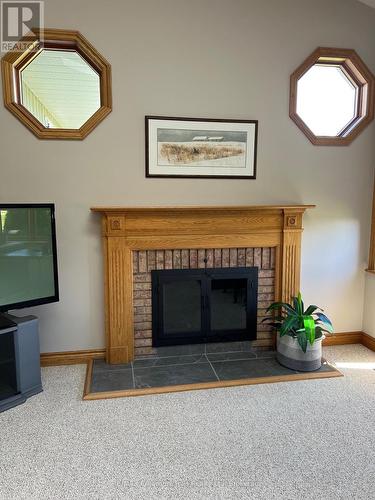 2332 Centre Line, Clearview, ON - Indoor Photo Showing Living Room With Fireplace
