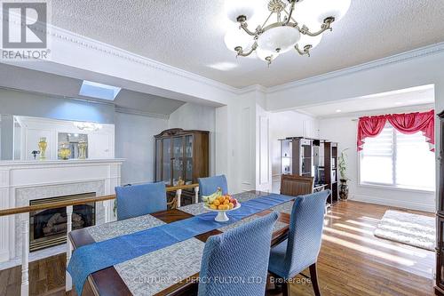 56 Snowball Crescent, Toronto, ON - Indoor Photo Showing Dining Room With Fireplace