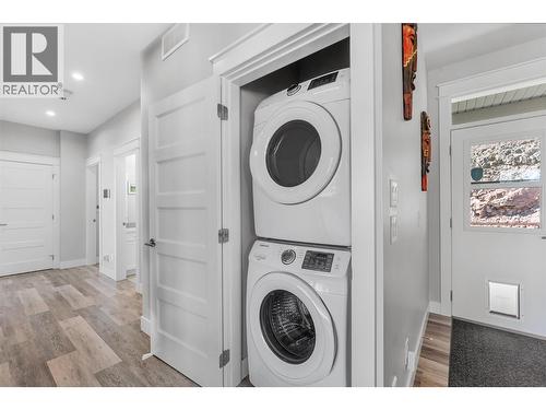 Laundry on the main level - 2600 Paramount Drive, West Kelowna, BC - Indoor Photo Showing Laundry Room