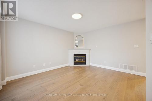 1781 Woodgate Trail, Oshawa, ON - Indoor Photo Showing Other Room With Fireplace
