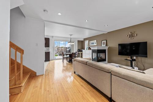 Overall view - 87 Rue Charles-Yelle, La Prairie, QC - Indoor Photo Showing Living Room With Fireplace