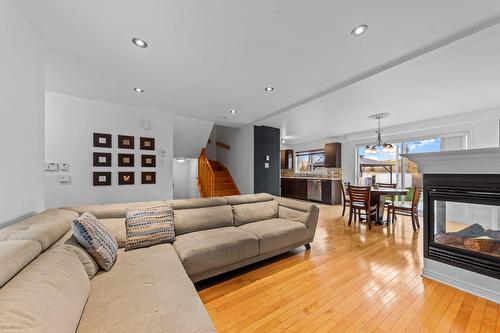 Overall view - 87 Rue Charles-Yelle, La Prairie, QC - Indoor Photo Showing Living Room With Fireplace