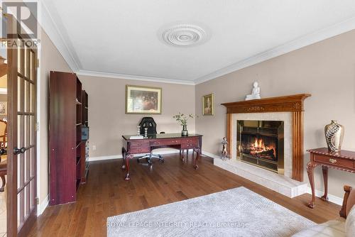22 Marchbrook Circle, Ottawa, ON - Indoor Photo Showing Living Room With Fireplace