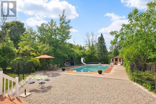 22 Marchbrook Circle, Ottawa, ON - Outdoor With In Ground Pool