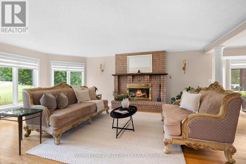 22 Marchbrook Circle, Ottawa, ON - Indoor Photo Showing Living Room With Fireplace