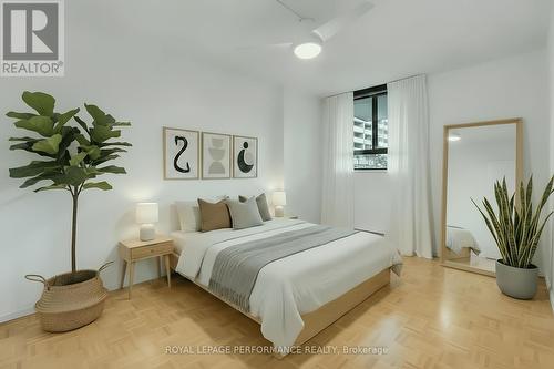 This photograph is virtually staged - 308 - 475 Laurier Avenue W, Ottawa, ON - Indoor Photo Showing Bedroom