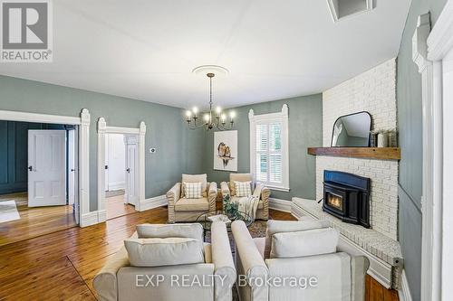 7823 Bickle Hill Road, Hamilton Township, ON - Indoor Photo Showing Living Room With Fireplace