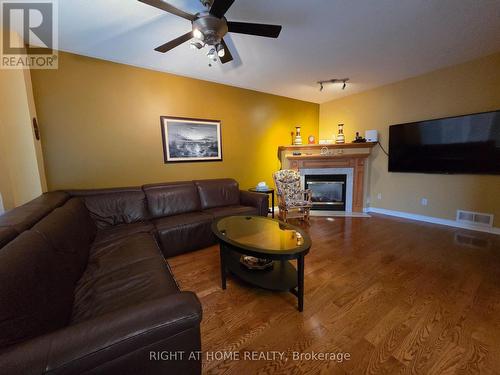 Separate Family Room with Gas Fireplace - 96 Maple Stand Way, Ottawa, ON - Indoor Photo Showing Living Room With Fireplace
