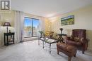 Sliding doors to Balcony - 403 - 93 Westwood Road, Guelph (Willow West/Sugarbush/West Acres), ON  - Indoor Photo Showing Living Room 
