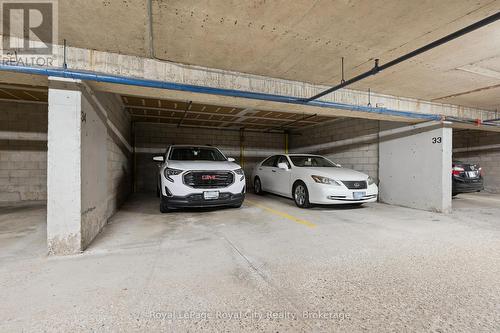Secure Underground parking - 403 - 93 Westwood Road, Guelph (Willow West/Sugarbush/West Acres), ON - Indoor Photo Showing Garage